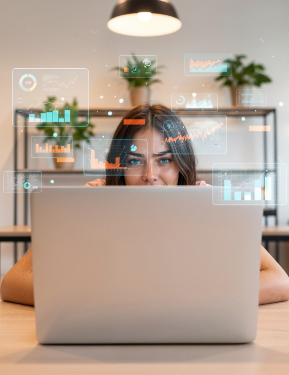 A salesperson working on their laptop with sales for AI